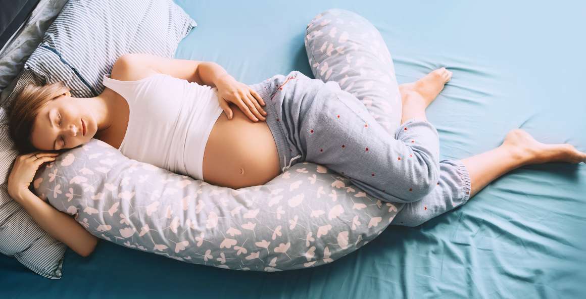 poziția ideală de dormit în timpul sarcinii - primele 3 luni